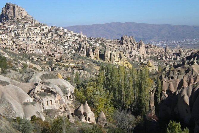 Cappadocia Day Tour From Istanbul - Cavuşin Village (Rose Valley): mushroom-top chimneys close to homes