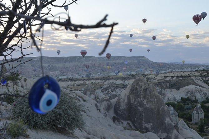 Cappadocia Hot Air Balloon Ride with Breakfast and Champagne - Rose (Red) Valley above: color that changes as you watch