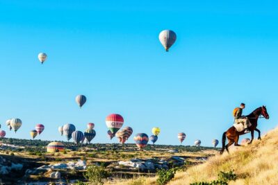 Cappadocia Sunrise Horse Riding - Rose Valley: balloons rising from below
