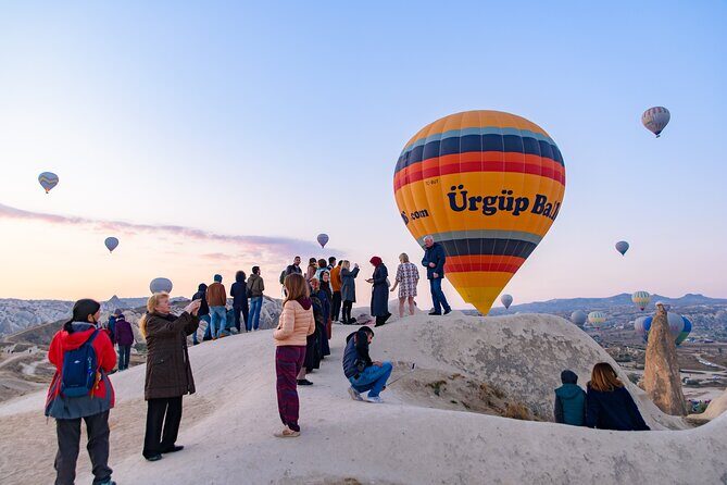 Cappadocia Sunrise Hot Air Balloon Watching Tour w/Transfer - Stop 1 in Göreme: Inflations, Then the First Takeoff Views