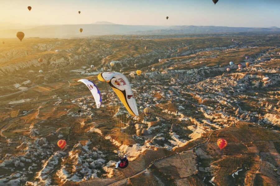 From Urgüp/Göreme: Cappadocia Tandem Paragliding & Transfer - The Tandem Flight: Fairy Chimneys, Villages, and How the Ride Feels
