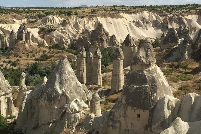 Full-Day Sacred and Surreal Cappadocia Tour from Goreme - Love Valley viewpoint: volcanic drama and column-shaped chimneys