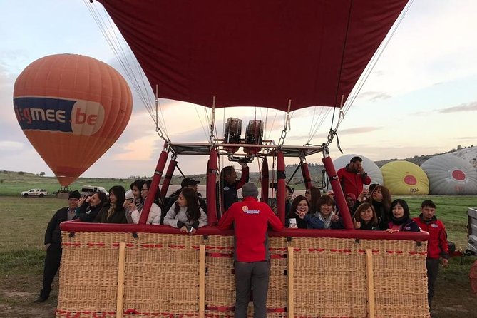 Hot Air Balloon Ride Cappadocia Goreme & Champagne party - The Flight Moment: Licensed Pilots and 1 Hour Above Cappadocia