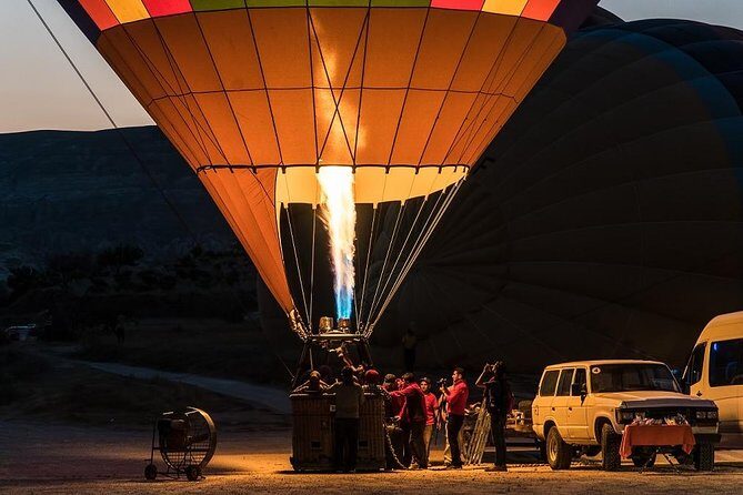 Sunrise Hot Air Balloon Flight Over Göreme & Fairy Chimneys - The Göreme Morning: Pickup, Transfers, and Watching the Sky Fill In